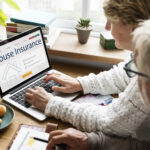 senior-couple-consulting-house-insurance-laptop-1536x1025-2