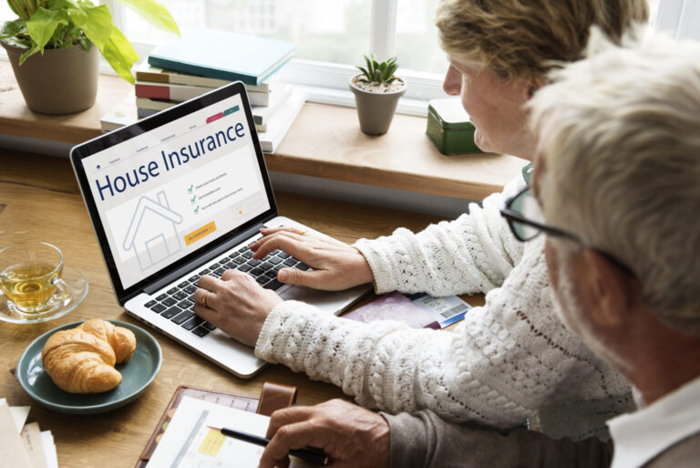 senior-couple-consulting-house-insurance-laptop-1536x1025-2